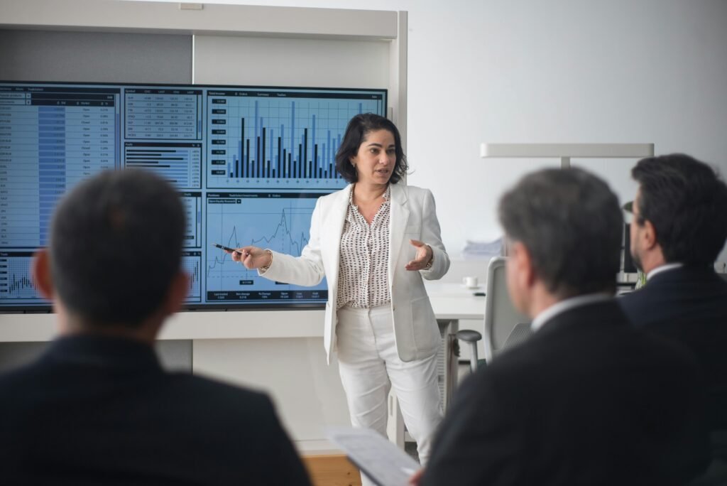 Consultant presenting a growth strategy framework to a leadership team