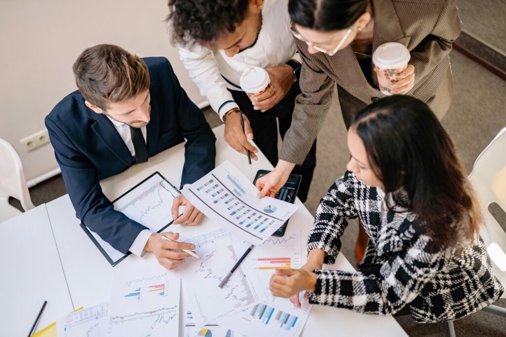 Team reviewing revenue and conversion data during a growth strategy consulting session
